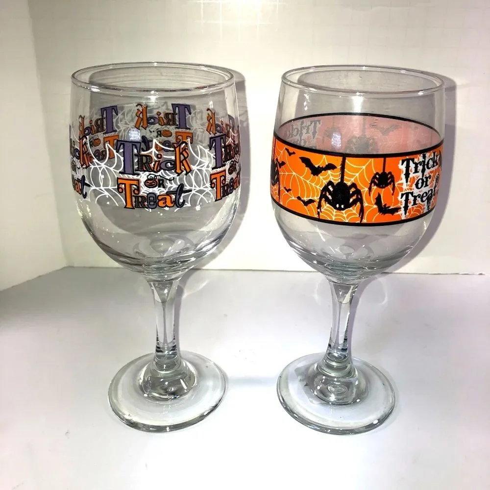 1pair of Trick or Treat Wine glasses HALLOWEEN decor 7 inches tall EUC